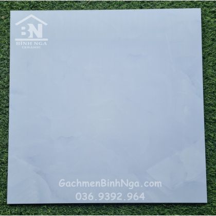 Gạch đá bóng kiếng trắng sáng vân xám nhẹ 60x60  