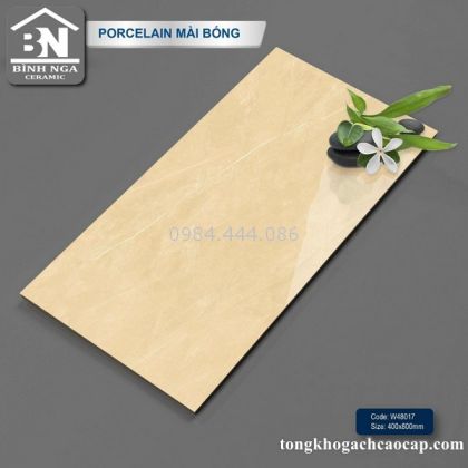 Gạch 40x80 bóng kính màu vàng ít vân  